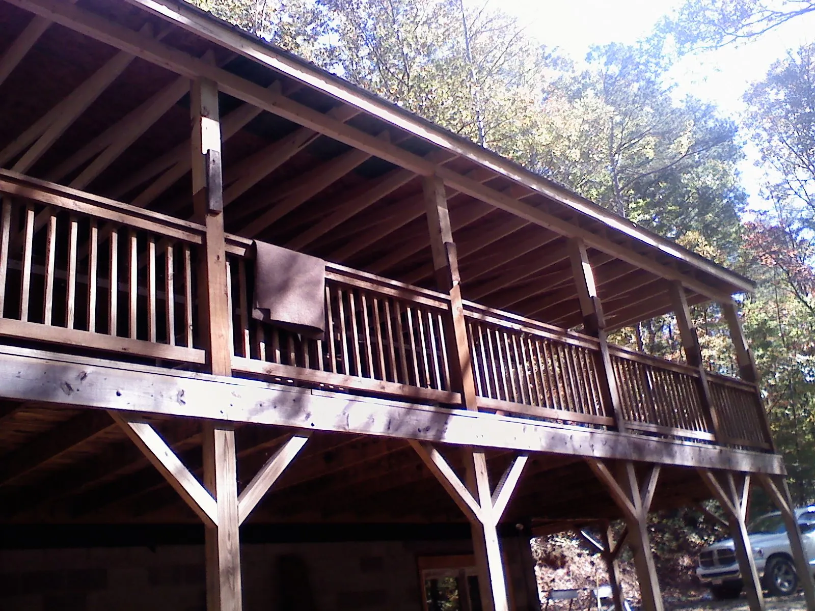 Timber framing under a new elevated porch and deck — Roof Leak Repair in Peterman by Roofing Brothers